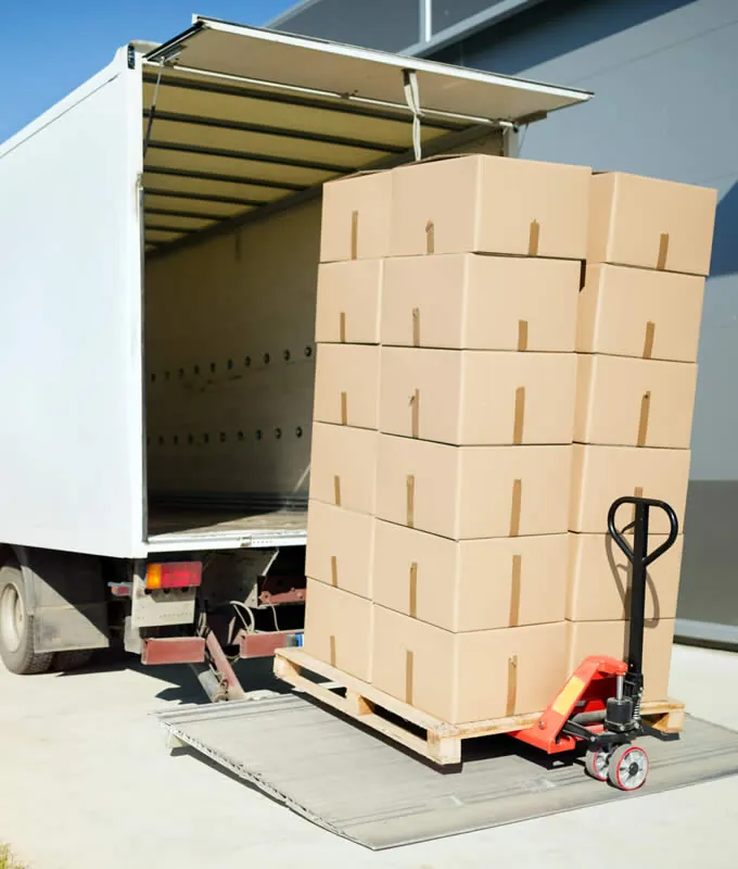 Truck being loaded with palletised boxes
