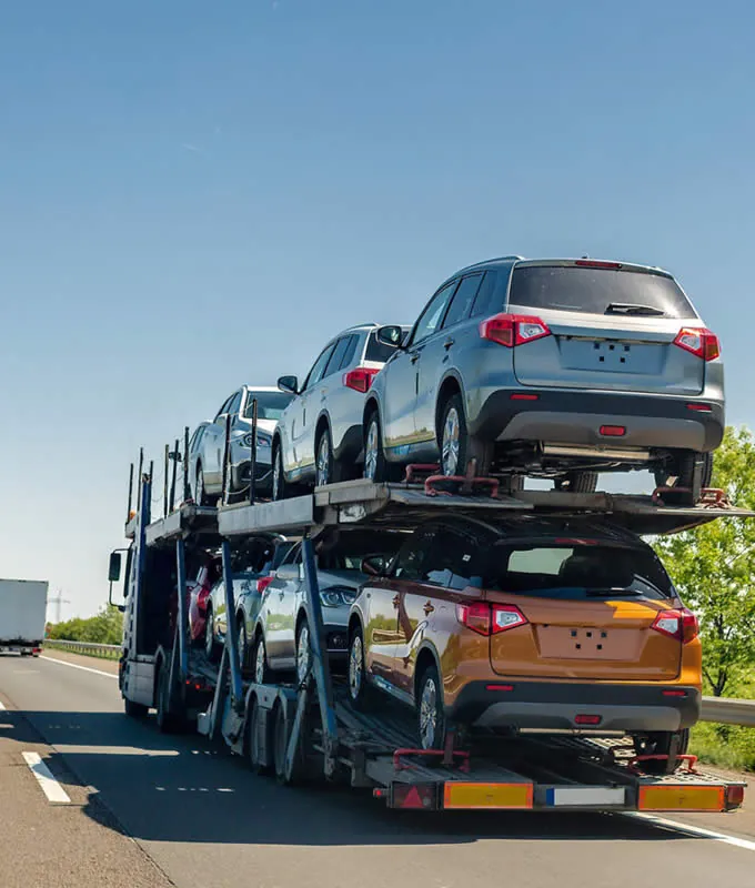 Car carrier transporting vehicles